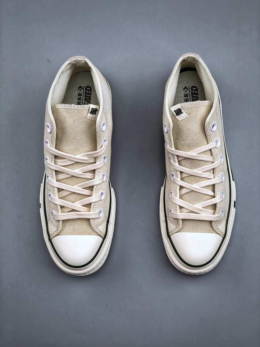 Convers! X Undefeated Chuck 70 Mid Sneakers