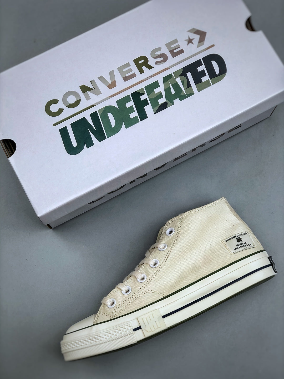 Convers! X Undefeated Chuck 70 Mid Sneakers