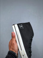 Convers! X Undefeated Chuck 70 Mid Sneakers
