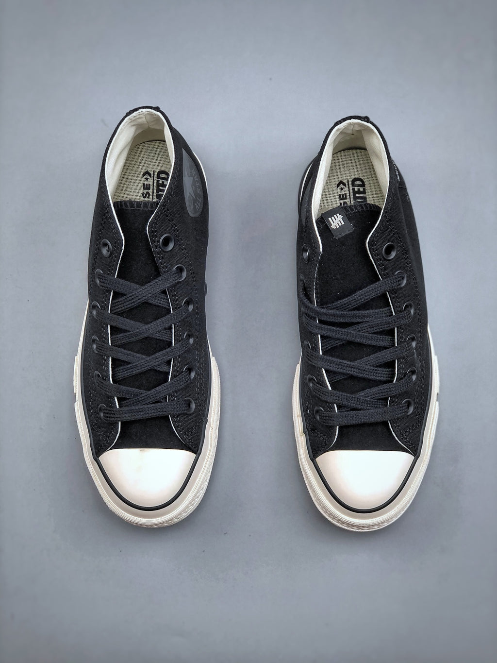 Convers! X Undefeated Chuck 70 Mid Sneakers