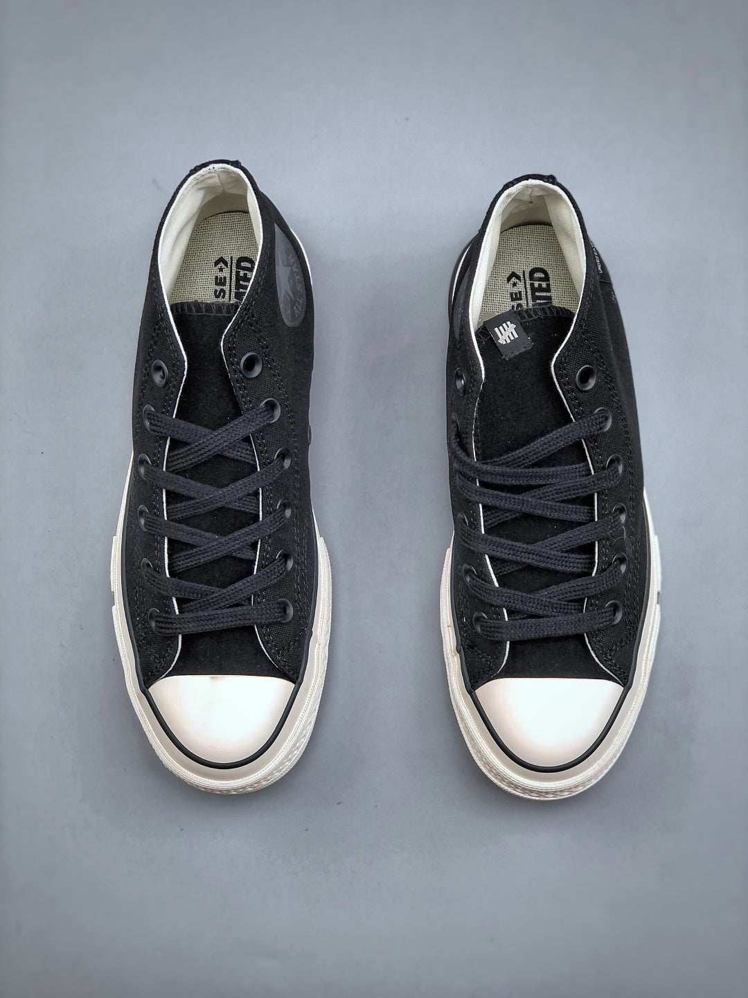 Convers! X Undefeated Chuck 70 Mid Sneakers