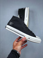 Convers! X Undefeated Chuck 70 Mid Sneakers