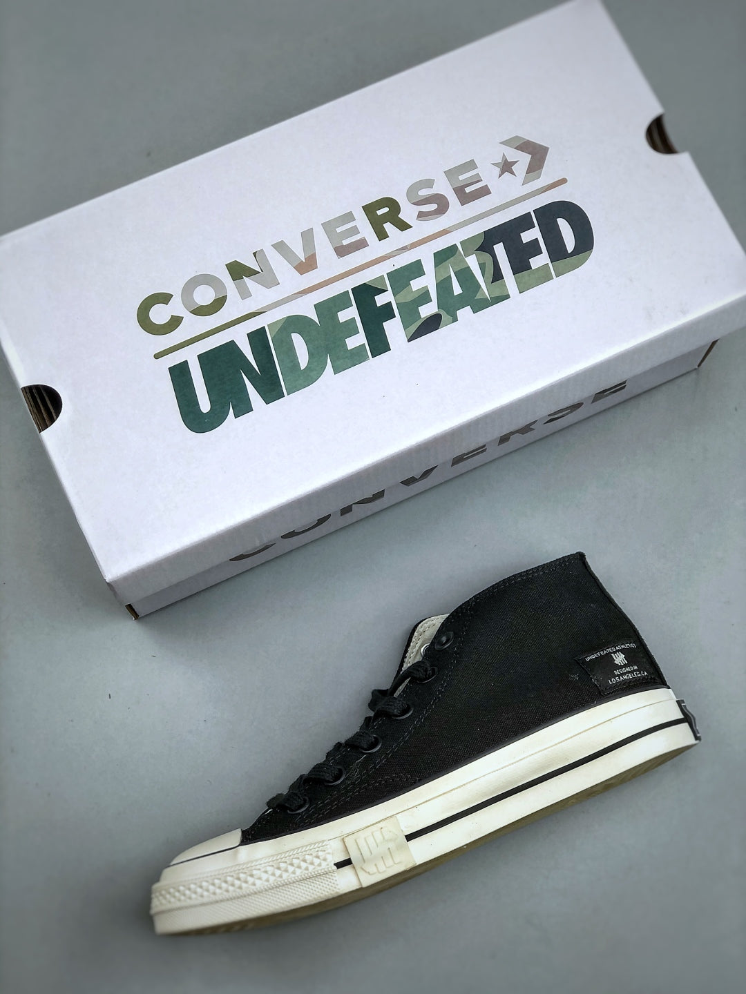 Convers! X Undefeated Chuck 70 Mid Sneakers