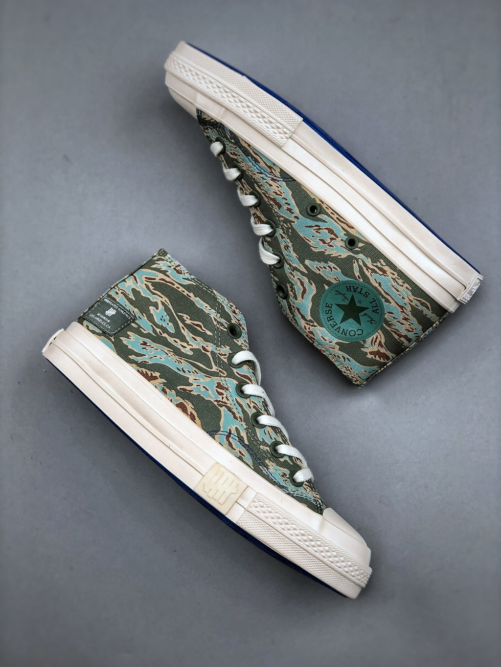Convers! X Undefeated Chuck 70 Mid Sneakers