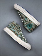Convers! X Undefeated Chuck 70 Mid Sneakers