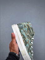 Convers! X Undefeated Chuck 70 Mid Sneakers