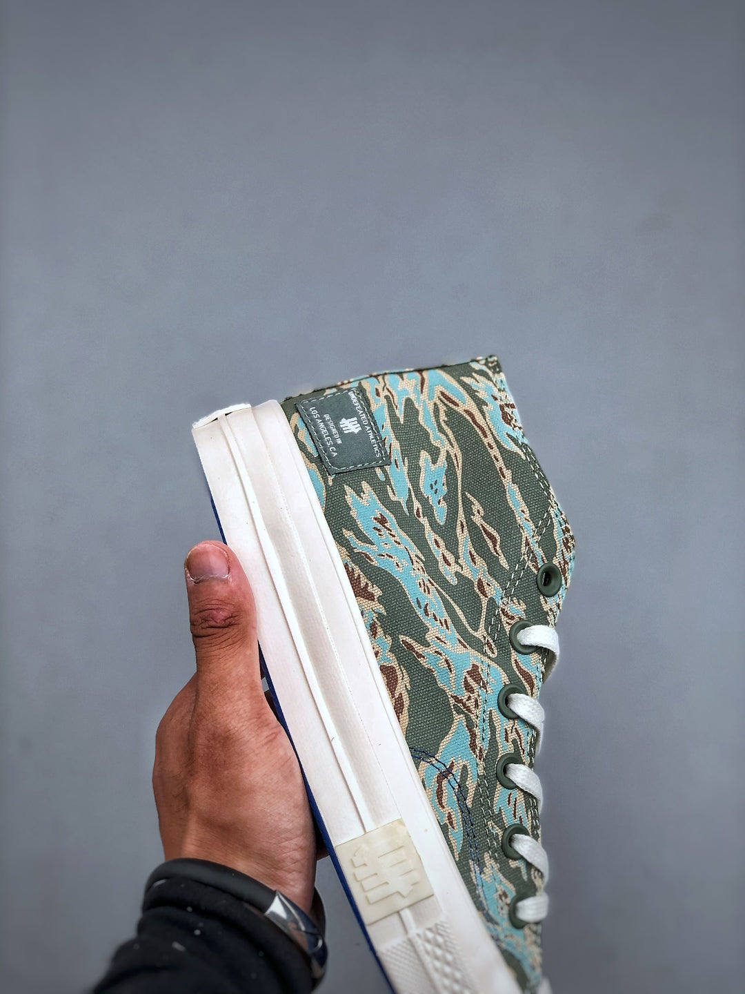 Convers! X Undefeated Chuck 70 Mid Sneakers