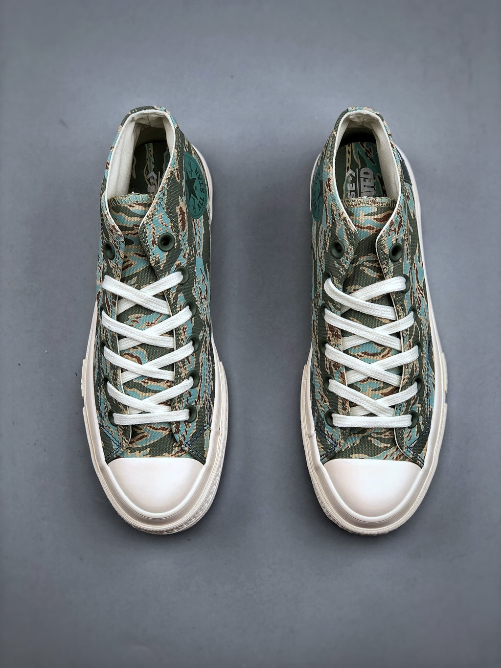 Convers! X Undefeated Chuck 70 Mid Sneakers