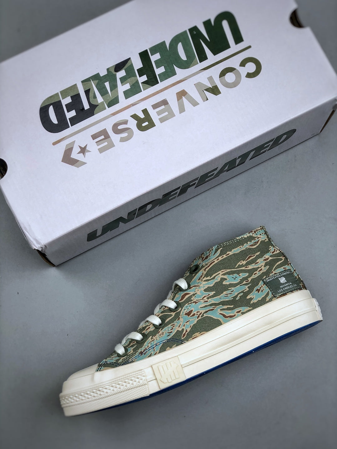 Convers! X Undefeated Chuck 70 Mid Sneakers