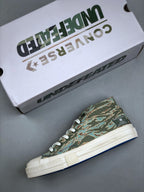 Convers! X Undefeated Chuck 70 Mid Sneakers