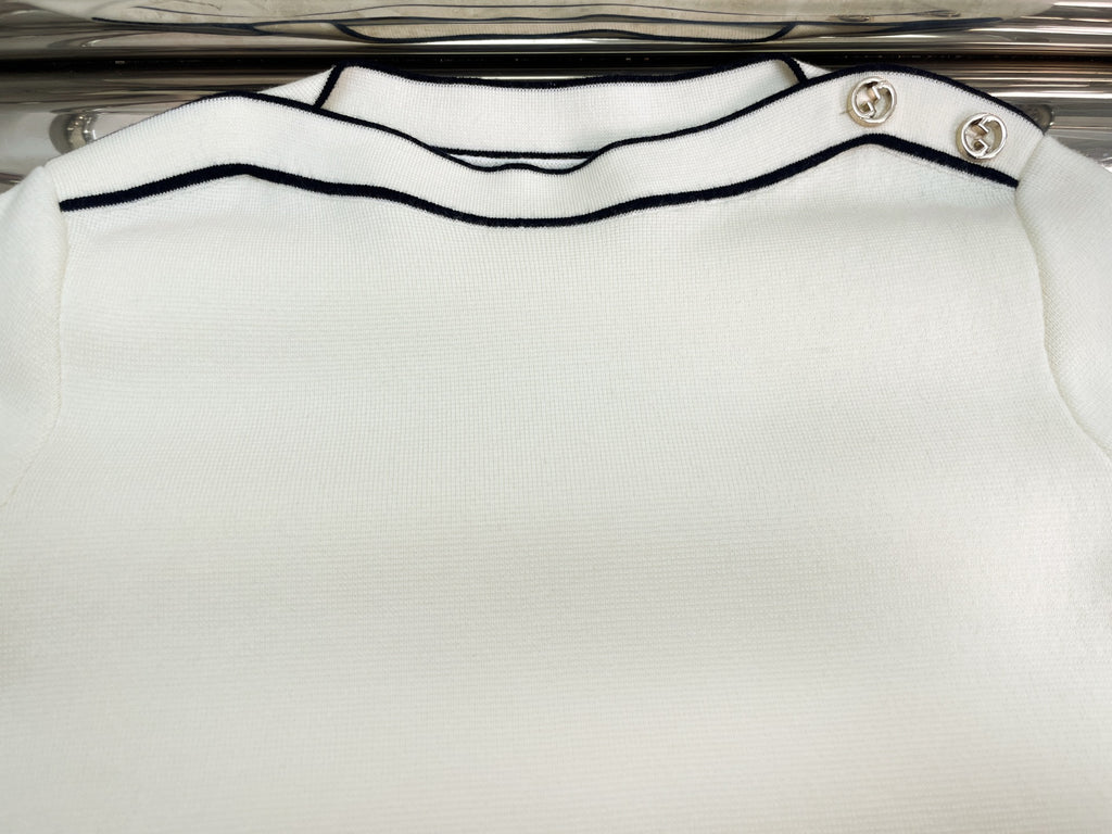 GU one-shoulder sweater