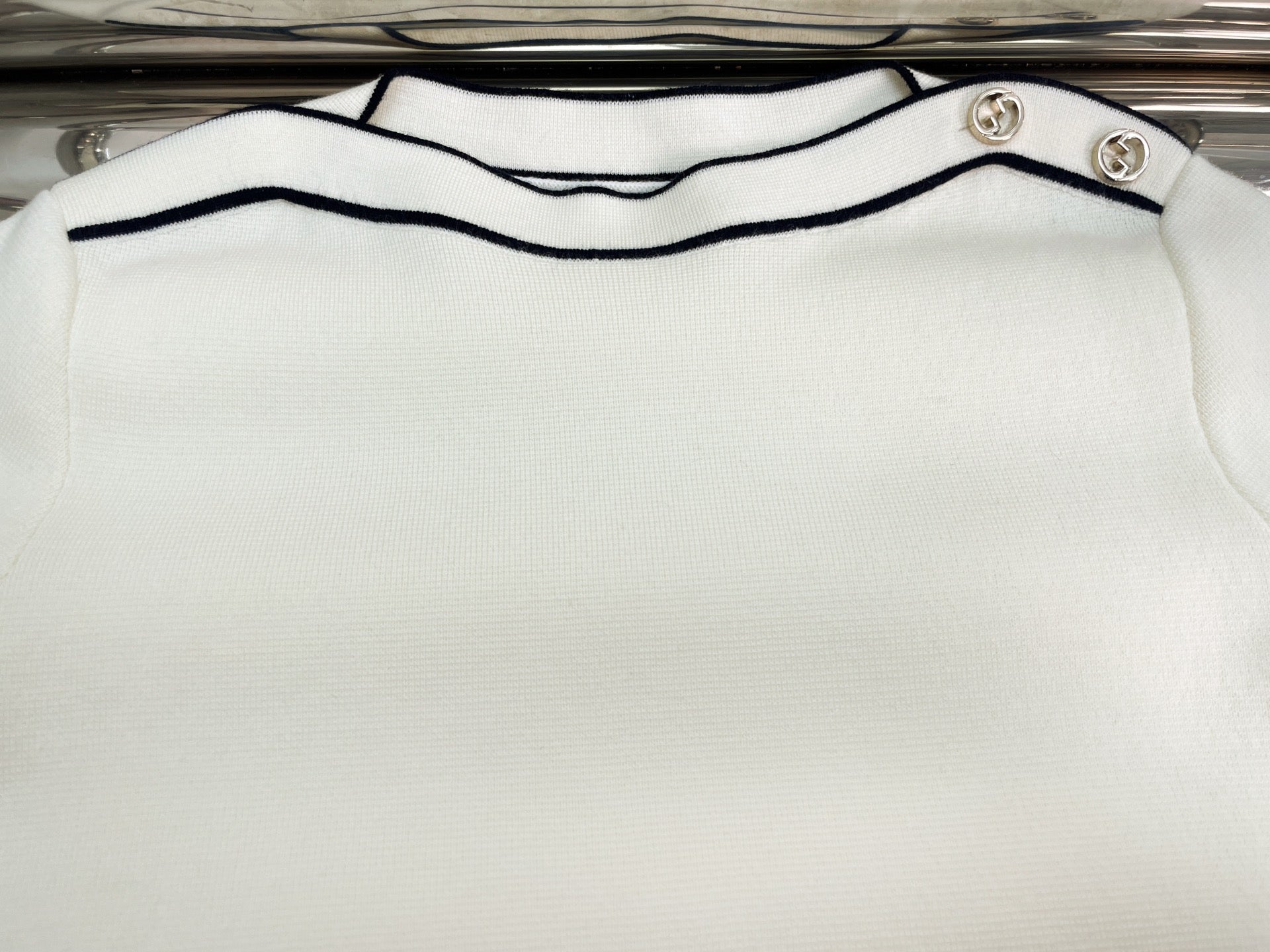 GU one-shoulder sweater