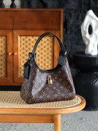 Sac à main LV The Drop PM Monogram