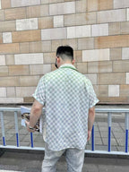 قميص بولو LV Damier Gradient المطبوع من الحرير والقطن بأكمام قصيرة