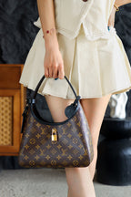 Sac à main LV The Drop PM Monogram