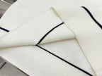 GU one-shoulder sweater