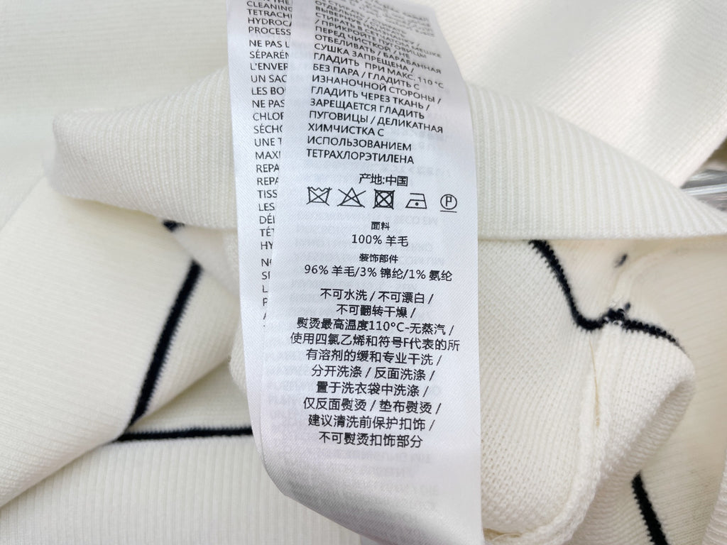 GU one-shoulder sweater