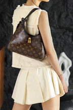 Sac à main LV The Drop PM Monogram