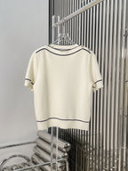 GU one-shoulder sweater