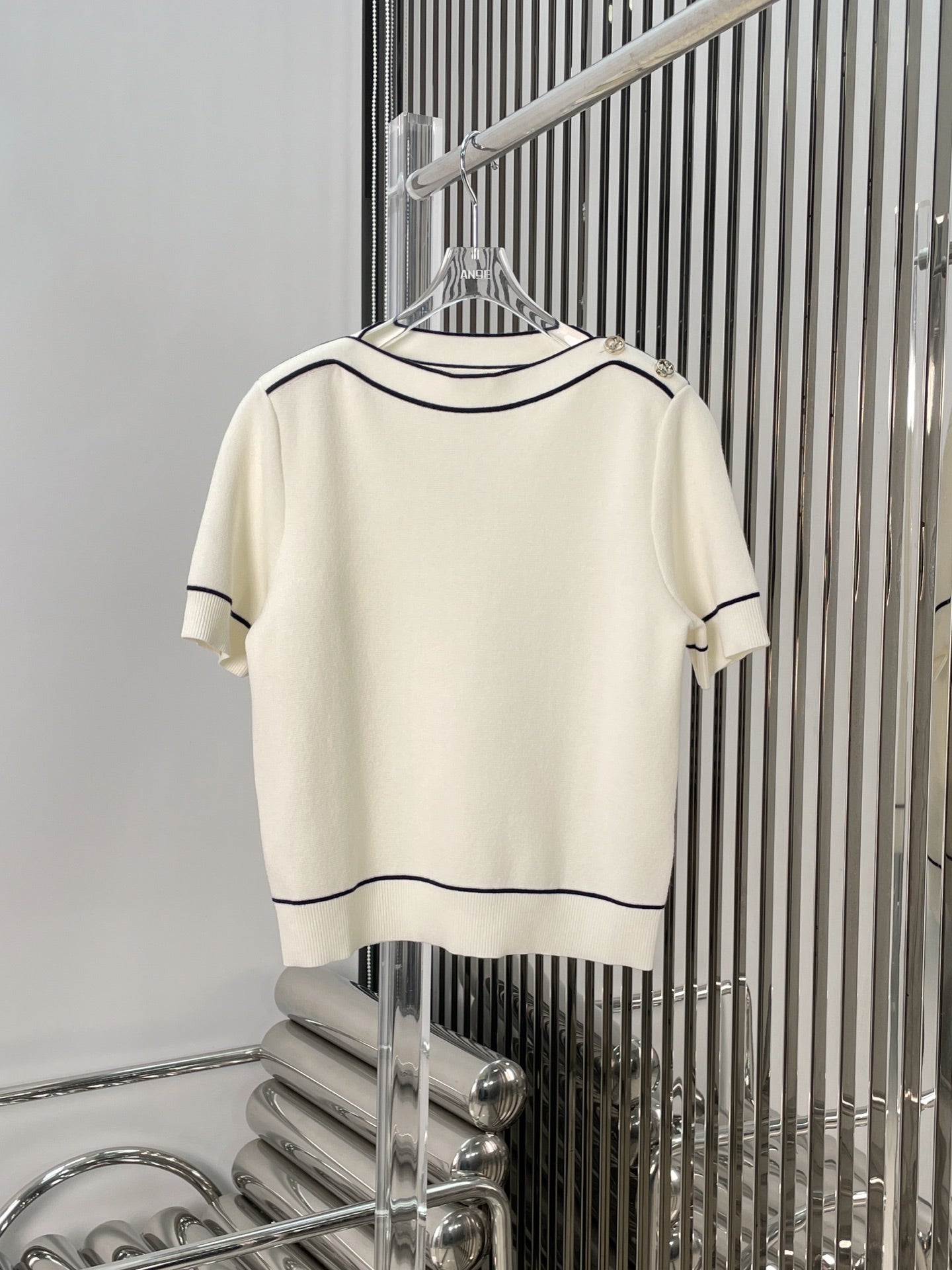 GU one-shoulder sweater
